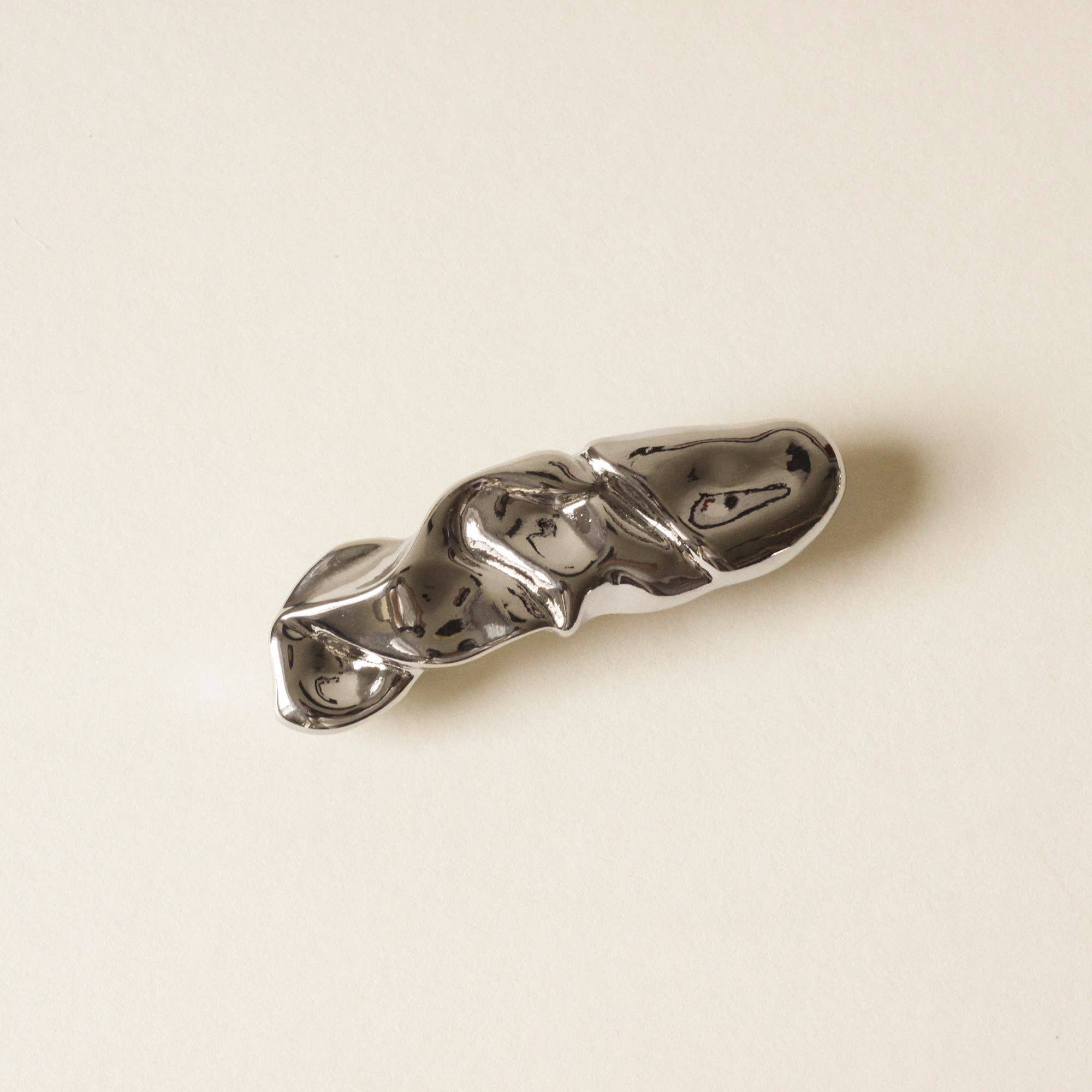 Barrette métallique texturée