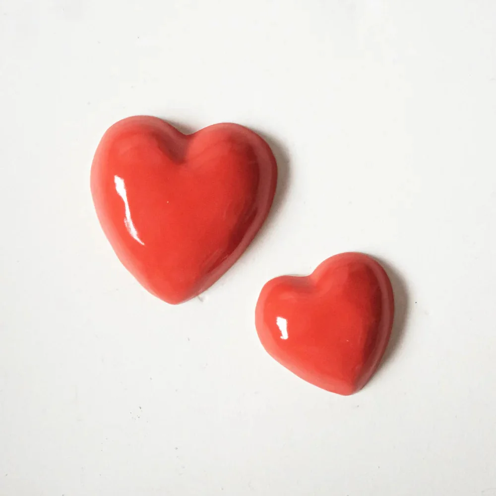 Duo de coeurs muraux en céramique 