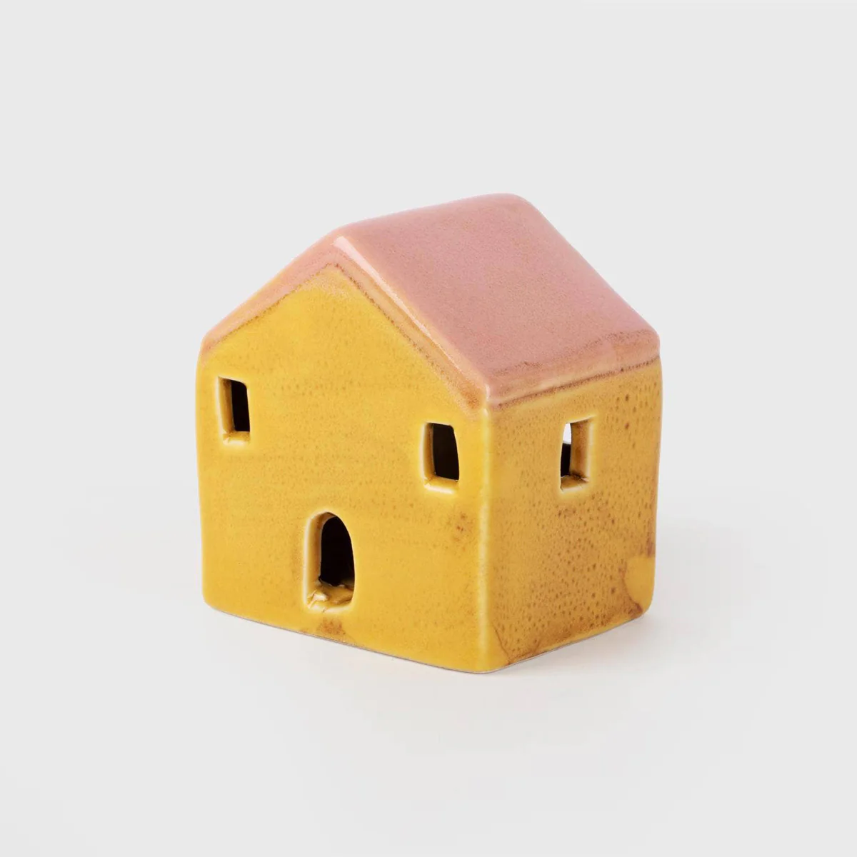 Petite maison jaune lumineuse en céramique